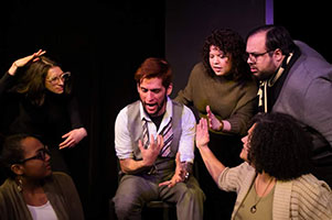 Chris Rodriguez, colorectal cancer patient diagnosed at age 35, performs with his improv group