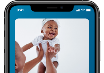 cropped view showing just the top of a phone with a baby on it